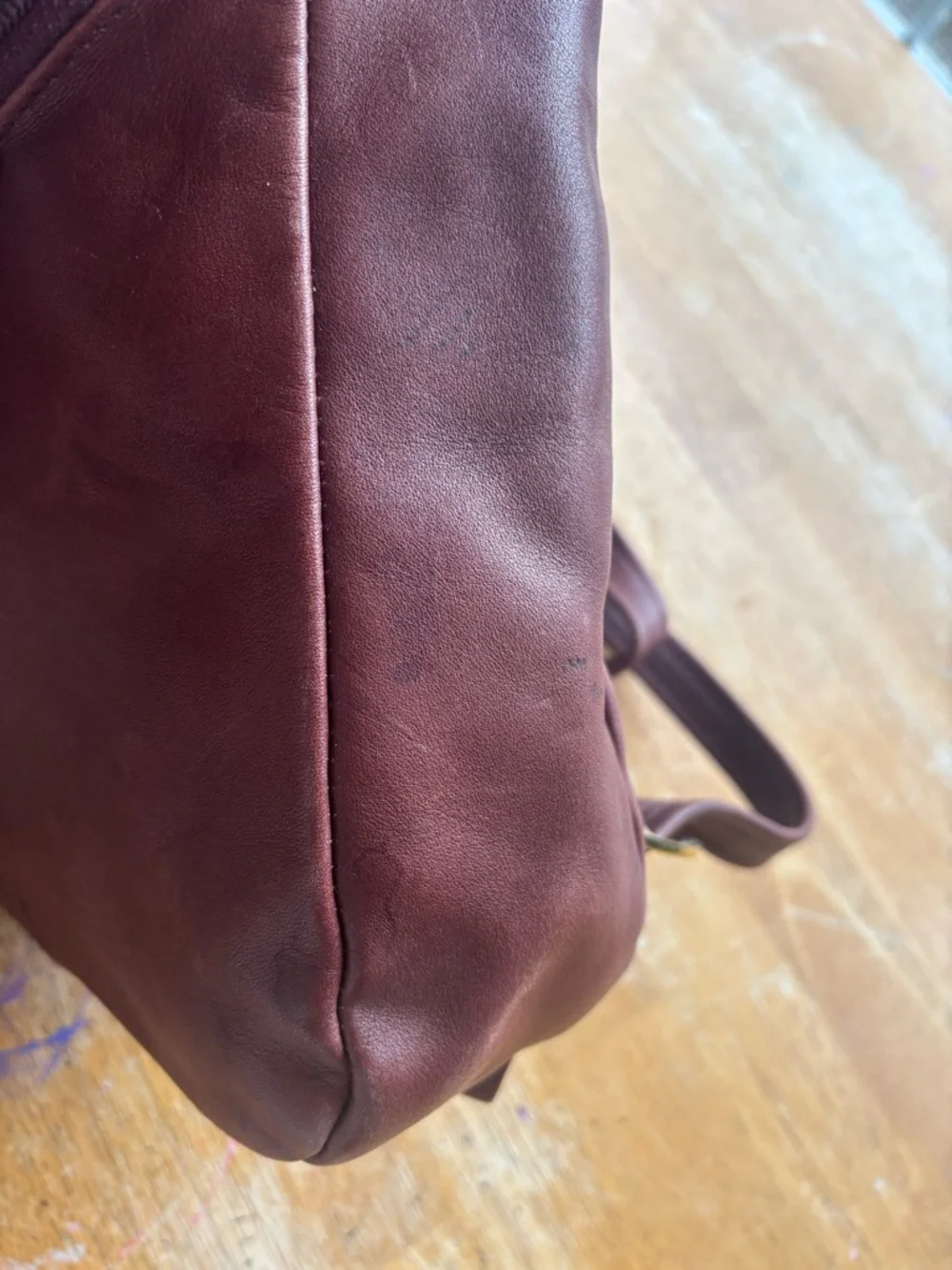 Tiganello Smooth Leather Backpack in Dark Brown with Gold Accent